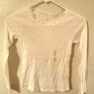 Long sleeved cream top